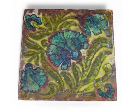 In the manner of William de Morgan, a Persian inspired experimental glazed tile, unmarked, 15cm wide