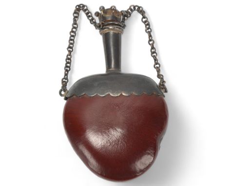 A small 19th century Chinese perfume flask made from a seed pod, with unmarked white metal mount, and original coronet design