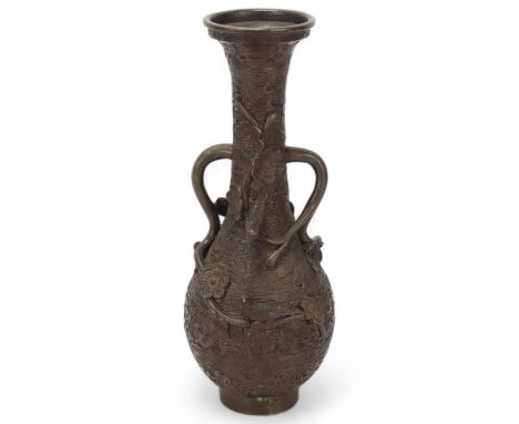 A Chinese bronze 2-handled vase, with birds and flowers in high relief, height 25cm, probably early to mid-20th centuryGood c