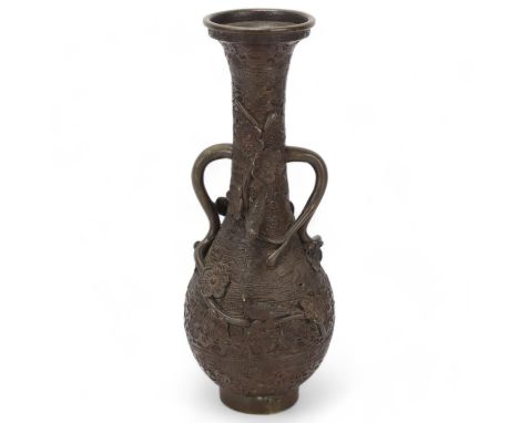 A Chinese bronze 2-handled vase, with birds and flowers in high relief, height 25cm, probably early to mid-20th centuryGood c