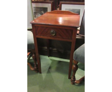 An Edwardian line inlaid mahogany lamp table, the single drawer over square tapering legs, 70cm tall x 43cm wide x 40cm deep 