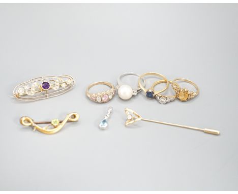 An 18ct and illusion set diamond ring, gross 2.4 grams, two 9ct gold and gem set rings, gross 4.8 grams, a yellow metal gem s