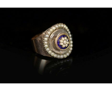 A Victorian gold, enamel seed pearl and rock crystal set oval mourning ring,with plaited hair beneath rock crystal mount, ins