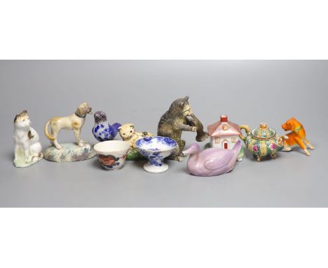 A quantity of miniature ceramic pots, figurines, animal ornaments etc