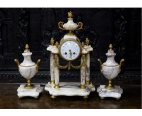 A late 19th century French three piece clock set, in Louis XVI taste with key and pendulum 42cm