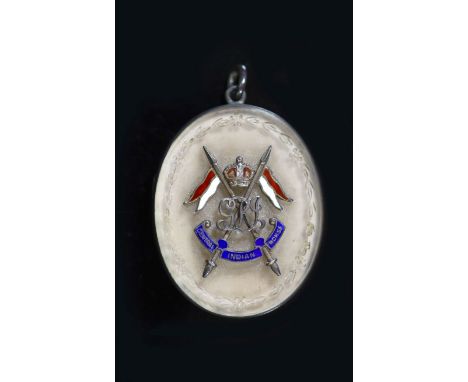 An early 20th century silver, rock crystal? and enamel set 'Central Indian Horse' cavalry regiment oval pendant locket,with c