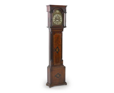 George Aickin of Cork.  A George III inlaid mahogany eight day longcase clock,the 13 inch arched brass dial with silvered Rom