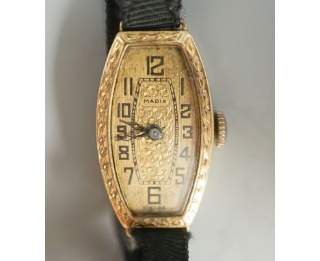 A lady's early 20th century 18ct gold manual wind wrist watch, case diameter 17mm, on a sash strap with 9ct buckle,gross weig