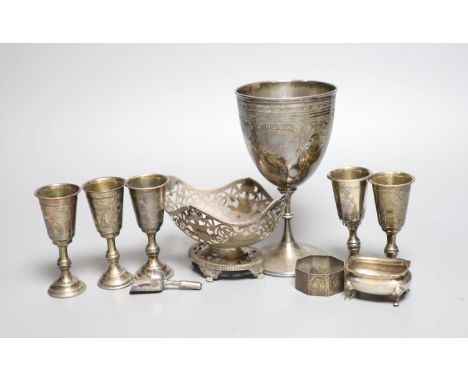 Five George V silver kiddush cups, a late Victorian silver goblet, a silver bonbon dish, silver salt, silver napkin ring and 