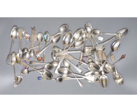 A mixed collection of assorted mainly silver and white metal tea and souvenir spoons, a Georgian silver caddy spoons and two 