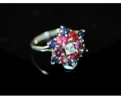 A mid 20th century platinum, ruby, sapphire diamond and amethyst cluster dress ring,set with square cut central diamond and r