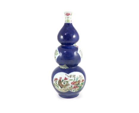 A famille rose blue ground ‘cockerel’ vase, probably Samson, late 19th century,of triple gourd form, painted with cockerels a