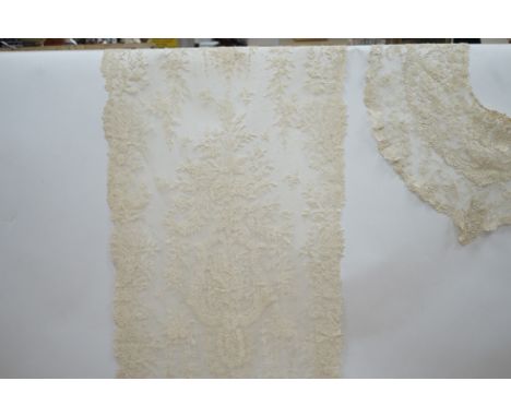 A mixed Brussels lace berth with fine needle lace floral insertions, together with a mixed bobbin veil and needleworked Bruss