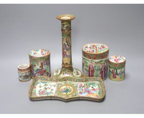 A Chinese Canton famille rose nest of boxes and covers, a similar candlestick and a tray 23cm