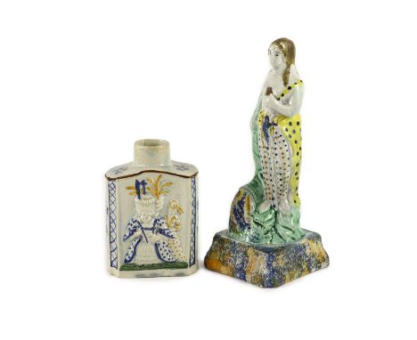 A Staffordshire Prattware pearlware tea caddy and figure of Flora, c.1790,the tea caddy moulded with Macaroni style figures, 