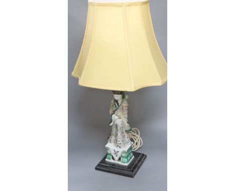 A Chinese famille verte figure of an immortal, mounted as a table lamp, height to fitting 49cm