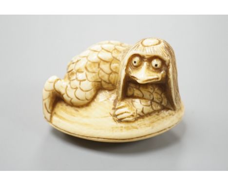 A Japanese ivory netsuke of a kappa on a clam shell, signed Gyokuzan, Meiji period, 4.8cm