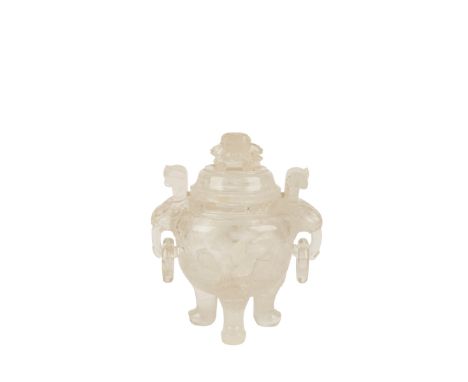 CARVED ROCK CRYSTAL TRIPOD CENSER, with twin dragon mask loop handles, the domed cover surmounted by a lion dog finial, 18cm 