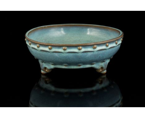 RARE IMPERIAL JUN 'NUMBER ONE' TRIPOD NARCISSUS BOWL, EARLY MING DYNASTY, the rounded sides raised on three ruyi-shaped feet,