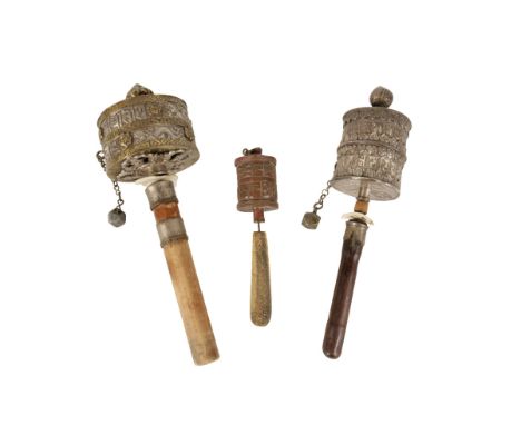 SILVER AND BRASS HAND PRAYER WHEEL (MANI), TIBET, 19TH CENTURY, with ornate applied decoration and wood handle, 26cm high; to