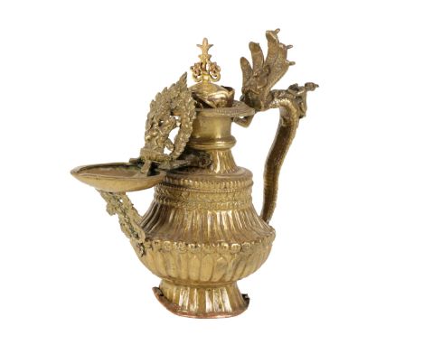 GILT COPPER OIL LAMP, INDIA, 19TH CENTURY, the baluster sides embossed with bands of stiff leaves and flutes, within a band o