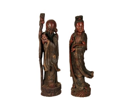 PAIR OF LARGE CARVED LACQUER WOOD FIGURES, REPUBLIC PERIOD, depicting Shoulao and Guanyin, 182cm high, 178cm high Provenance: