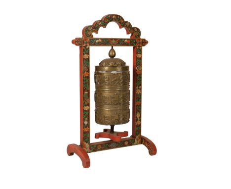 COPPER TEMPLE PRAYER WHEEL (MANI) ON LATER PAINTED WOOD STAND, TIBET, 19TH CENTURY, of cylindrical form with embossed bands o