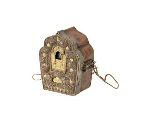 FINE SILVER, COPPER AND GILT GAU SHRINE, TIBET, 19TH CENTURY, the ornate chased silver front decorated with foliate scrolls a