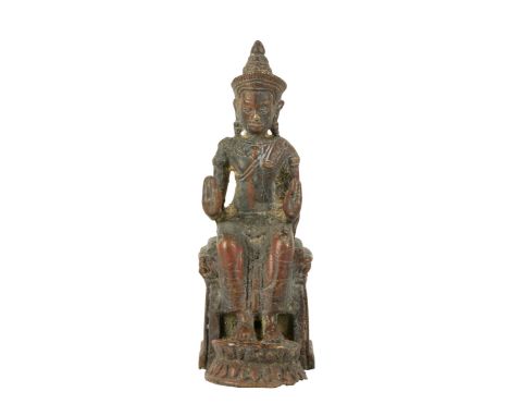 SEATED BRONZE BOTTISATTVA, SRI LANKA 18TH / 19TH CENTURY modelled as the figure seated on a throne with hands in Abhaya mudra