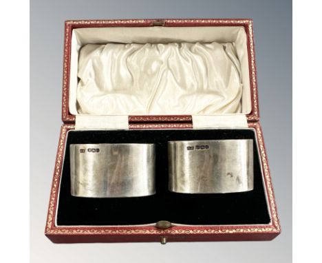 A boxed pair of George V silver napkin rings, George Howson, Sheffield 1933.  CONDITION REPORT: 96g