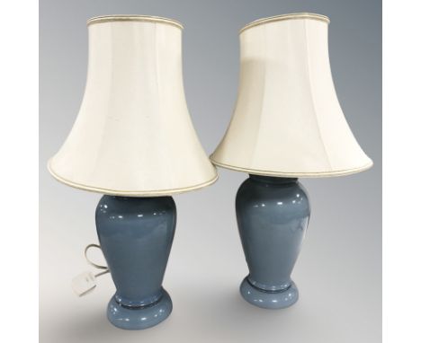 A pair of Denby blue glazed pottery table lamps with shades, height 59 cm (one requires a new plug) 