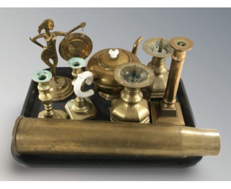 A large inert brass ammunition shell, pair of pricket candlesticks, gong in the form of a lady, etc. 