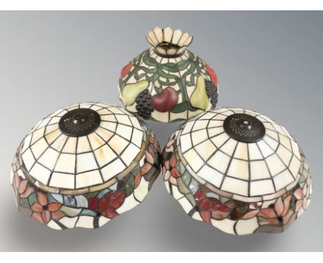 Two Tiffany style stained and leaded glass light shades, diameter 33 cm.