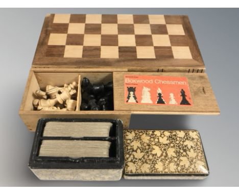 A turned boxwood chess set, a further modern folding chessboard and set of pieces, and a cashmere papier mache playing card b