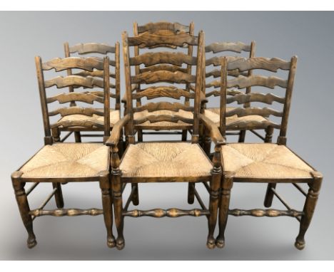 A set of six reproduction elm farmhouse ladder back dining chairs with rush seats 