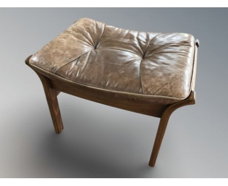 A Danish bentwood and stitched leather footstool, width 60 cm.
