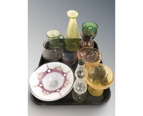 A group of coloured glass vessels including a uranium glass pitcher, pair of crystal sifters.