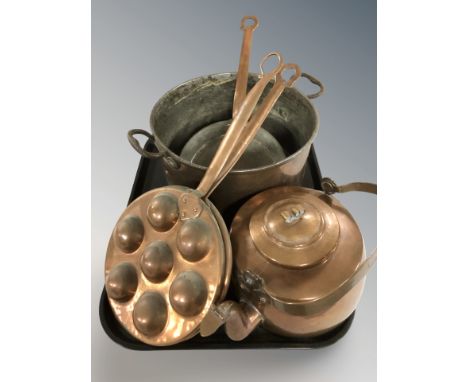 A twin handled copper cooking pot, skillets, tea pot, etc.