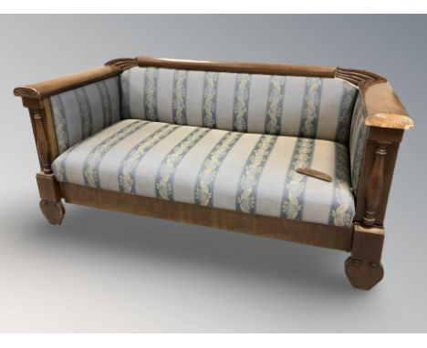 An early 20th century continental mahogany hall settee, 164 cm W x 70 cm D x 77 cm H.