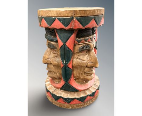 A carved and painted wooden plant stand or stool, height 41cm. 