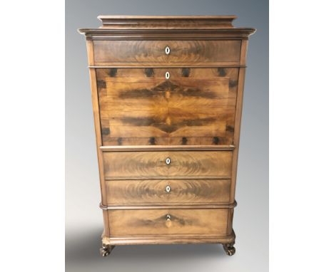 A 19th century continental walnut secretaire cabinet, 102 cm W x 50 cm D x 160 cm H.