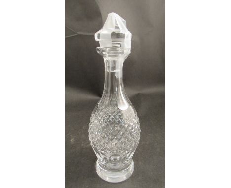 A crystal glass decanter 