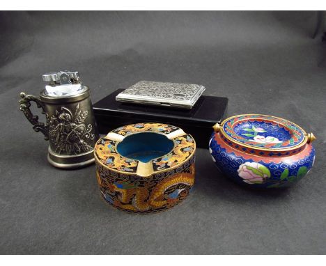 Two cloisonné ashtrays with other smoking ephemera including cigarette case and lighter