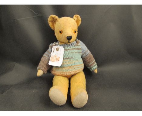 A 1930's Pedigree care worn teddy bear