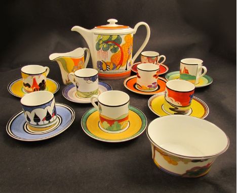 A boxed set of Wedgwood Clarice Cliff limited edition Connoisseur collection teapot, sugar and cream, together with eight cup