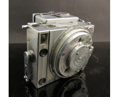 A 1930's Jaeger LeCoultre Compass camera with Cubitt & Son roll film back