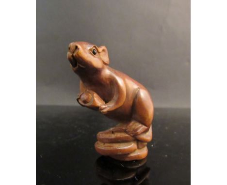 A signed Netsuke of a mouse 