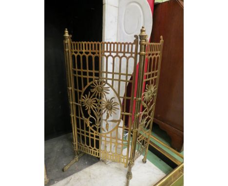 An Art and Crafts brass fire screen, a/f