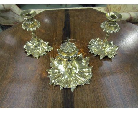 A pair of brass mythical dolphin candlesticks and a matching inkwell, marked William Tonk & Son