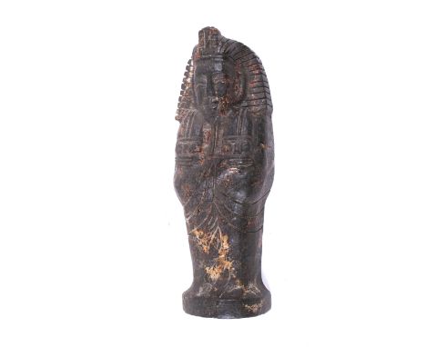 A piece of possible iron meteorite carved into the form of an Egyptian sarcophagus. L23.5cm (AF)Vendor has reportedly had the